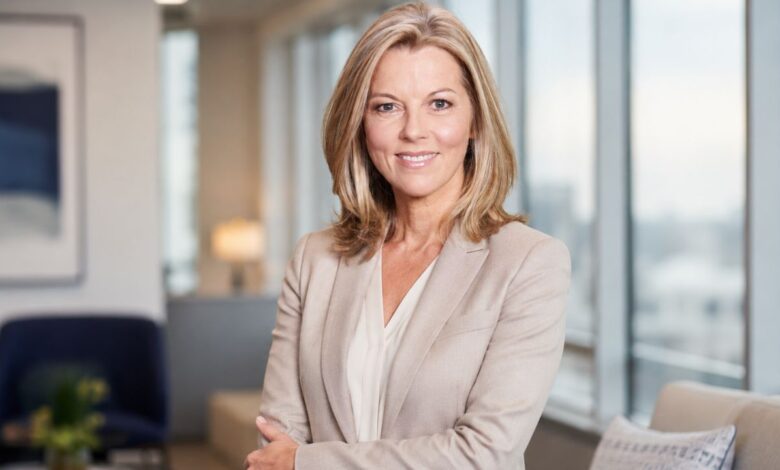 Professional female news presenter in a modern office setting for an article about Mary Nightingale illness rumours and verified health updates