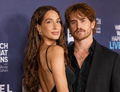 Amanda Batula and West Wilson posing together at a red carpet event