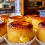 Authentic piononos de Santa Fe with caramelized tops in a Granada bakery