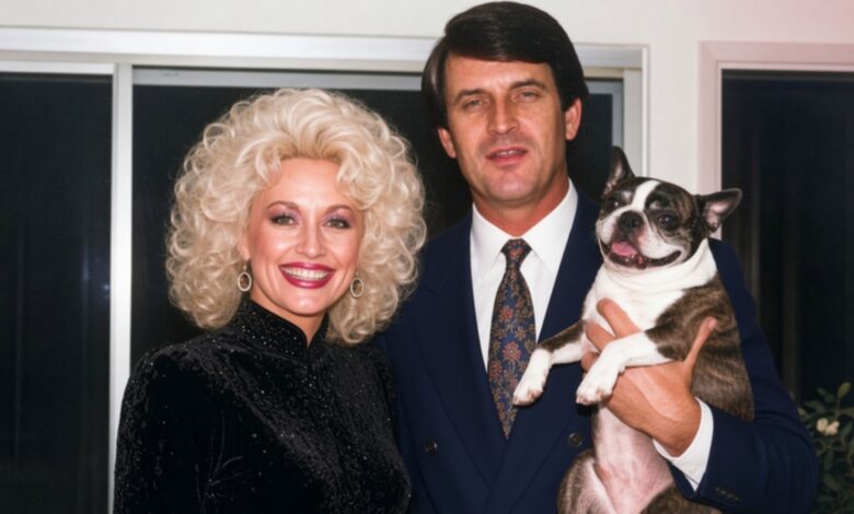 Country music couple posing together with a Boston Terrier at home