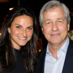 Laura Dimon and Jamie Dimon posing together at an indoor event