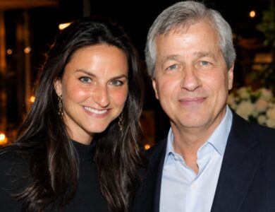 Laura Dimon and Jamie Dimon posing together at an indoor event