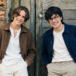 Matteo Firth with his brother in a relaxed outdoor setting