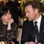 Eve Mavrakis and Ewan McGregor posing together at a formal gala