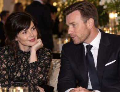 Eve Mavrakis and Ewan McGregor posing together at a formal gala