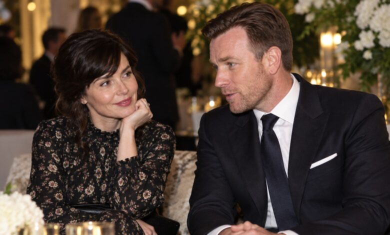 Eve Mavrakis and Ewan McGregor posing together at a formal gala